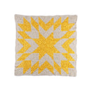 A square knitted throw pillow featuring a geometric starburst pattern in bright yellow on a light beige textured knit background, isolated on a white background.