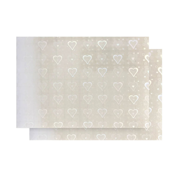 Two beige greeting cards with heart pattern on a white background