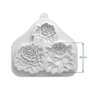White silicone mold with three embossed peony flower cavities, shown on a white background with a green dimension marker indicating 60mm height.