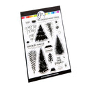 A sheet of clear stamps with black printed holiday designs, including Christmas trees, snowflakes, and phrases like 'Deck the Halls' and 'Tis the Season,' shown on a white backing card with a black border.