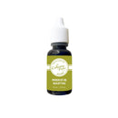 A small bottle of Cutching Powder Design Premium Dye Ink in the Martini shade, featuring a white dropper cap and a green label, set against a plain white background.