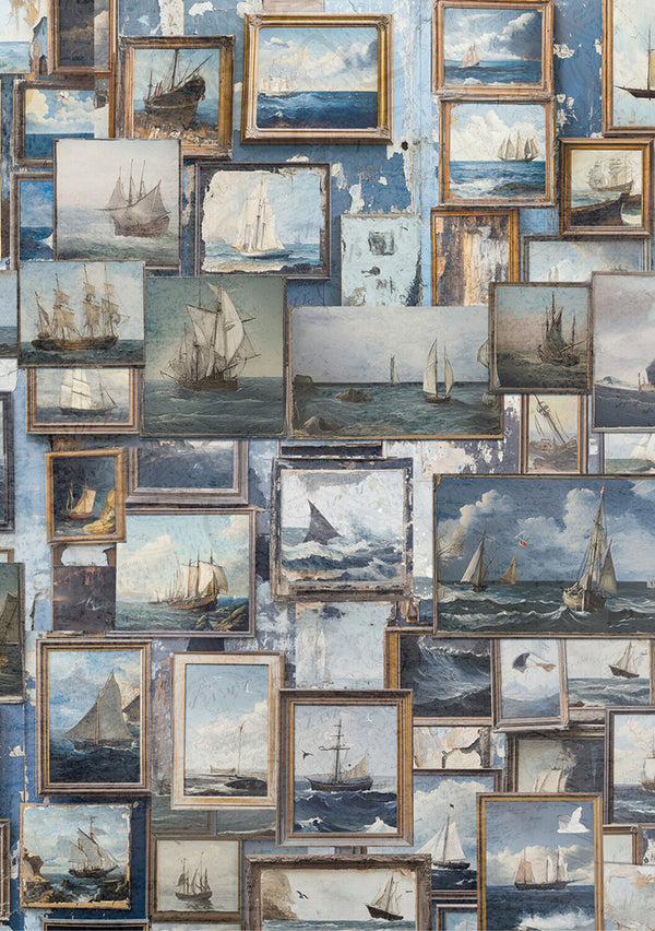 Wall with multiple framed paintings of ships at sea