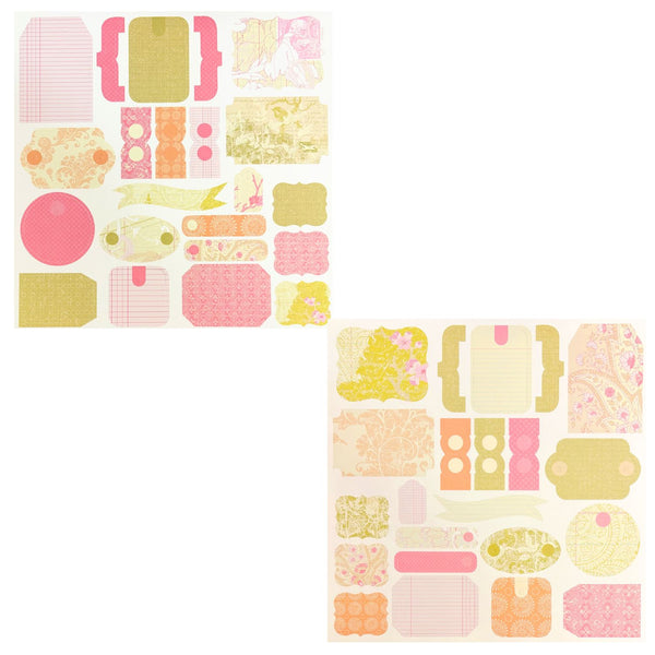 Two sheets of decorative scrapbook paper with vintage-inspired patterns in pink, yellow, and beige, displayed on a clean white background.
