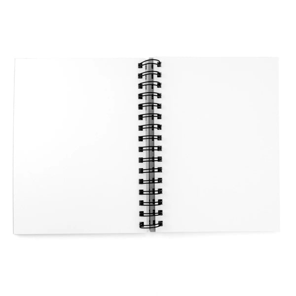 Open notebook with a black spiral binding on a white background