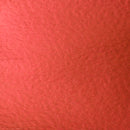 A close-up texture shot of a textured red material, likely paper or cardstock, filling the entire frame.