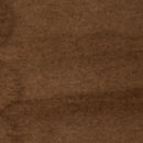 A close-up of a brown textured fabric or material surface with subtle tonal variation.