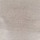 A close-up of a light warm gray or beige textured surface with subtle mottling and a slightly glossy finish.