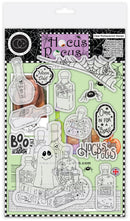 Hocus Pocus themed clear photopolymer stamp set in retail packaging, featuring ghost, potion bottle, spider, moon dial, and spooky text stamps.
