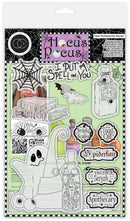 Hocus Pocus Clear Photopolymer Stamper sheet by Crafter's Companion, featuring various Halloween-themed clear stamps including a ghost, potion bottle, spiderweb, book, and labels on a light green background.