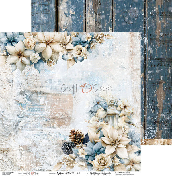 A square decorative paper or scrapbook design sheet shown on a rustic blue wood plank background. The main design features a distressed off-white and light blue winter floral arrangement with cream poinsettias, pale blue flowers, pinecones, and a lantern motif.