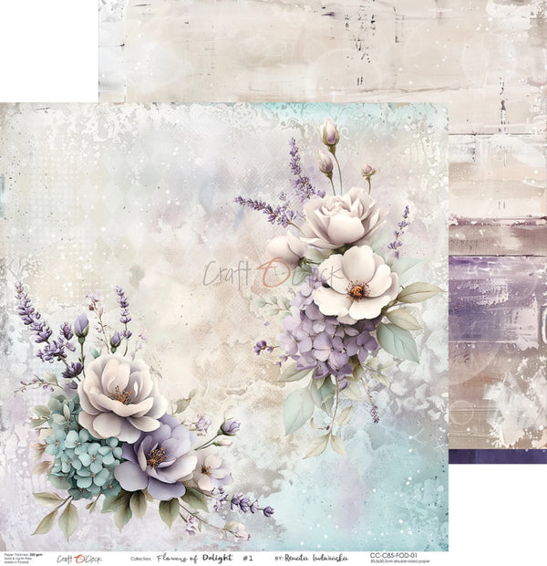 A decorative paper or scrapbook design sheet featuring a soft floral arrangement with large off-white blossoms, lavender-purple flowers, and pale blue hydrangeas on a distressed pastel background. The design includes visible brand text 'Crafty Designs' and product text 'Flowers of Delight