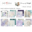 A collage of multiple textured paper sheets and a small printed paper sample set under the title 'BASIC MEDIUM PAPERS SET - 250gsm' with 'Flowers of Dolight' branding. The papers show soft pastel tones including lavender, mint, aqua, cream, and light purple, with distressed, watercolor, and woodgrain textures.