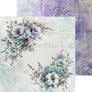 A decorative scrapbook paper or craft paper design featuring pastel floral arrangements in lavender, blue, and white on a textured lace background, with a second matching paper sheet partially visible behind it.
