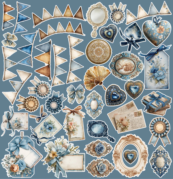 A collection of vintage-style decorative paper cutouts and embellishments in blue, beige, and gold tones, including hearts, ribbons, frames, floral elements, and bunting, arranged on a solid blue background.