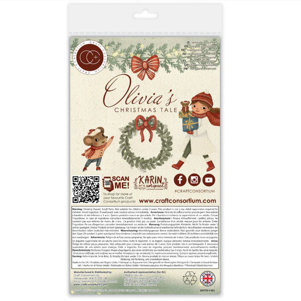 Packaged craft paper featuring a Christmas-themed illustration titled 'Olivia's Christmas Tale' with a mouse, a girl, a wreath, and holiday decorations on a cream background, shown in a hanging plastic sleeve.