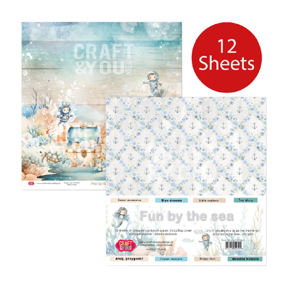 A craft paper set package labeled 'Fun by the sea' with a red circle reading '12 Sheets.' The package shows two sample paper designs: one with a pastel underwater scene and one with a repeating light blue anchor pattern on white.