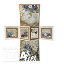 A vintage-style pop-up card or decorative box with floral artwork, shown open in a cross shape on a white background. The design features blue and cream flowers with beige and brown frames.