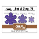 A product packaging card for a set of three purple die-cut craft stamps or mats by Crealies, showing three different purple flower-like shapes with dimensions and the brand logo.
