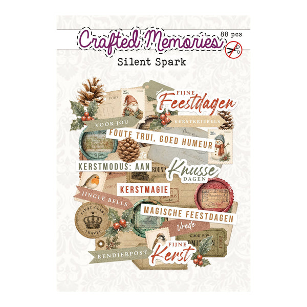 Crafted Memories 'Silent Spark' Christmas scrapbook paper sheet featuring a collage of vintage-style holiday labels, pinecones, holly, and festive text in warm neutral and red tones.
