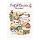 Crafted Memories 'Silent Spark' 92-piece scrapbook paper pack featuring a collage of vintage Christmas-themed labels, tags, pinecones, holly, and holiday text on a light cream patterned background.