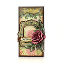 A vertical handmade greeting card featuring a vintage-style floral design with a prominent pink rose, green leaves, and an ornate frame. The card includes a banner reading 'Just Because' and a small tag on the right that reads 'You Make Me Love'.