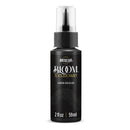 A bottle of Americana BLOOM Texture Paint in the color Carbon Void Black, featuring a black body, clear spray cap, and gold and white lettering on a white background.