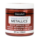 A jar of DecoArt Americana DECOR Metallics paint in the shade Bright Metallic, showing a shimmering coppery metallic paint color through the clear jar, with a white lid and white label.