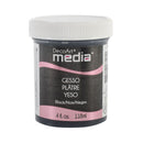 A jar of DecoArt Media Gesso in the color Yeso Black, featuring a white screw-on lid and a black and pink label, shown on a plain white background.