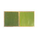 square green material samples side by side on a plain white background, one with a textured dark green surface and one with a smoother light green surface.