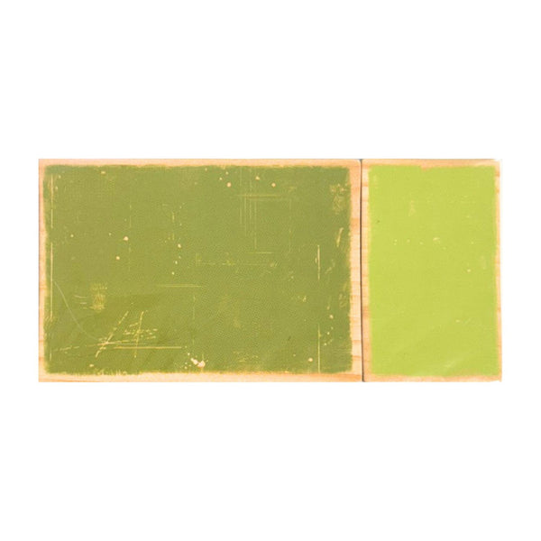 A rectangular wooden block with a split design, featuring a distressed olive green left side and a solid light green right side, set against a plain white background.