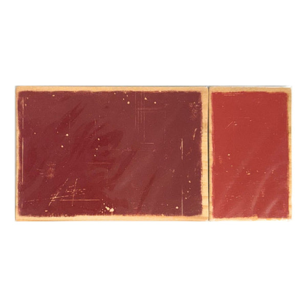 Two rectangle red chipboard panels with a light tan border, displayed side-by-side on a plain white background.