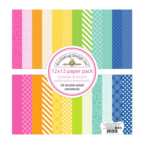 A 12x12 paper pack by Goodiebug Design Inc. featuring 12 double-sided cupcake and candy print patterns in pink, orange, yellow, green, and blue, arranged in a grid with a central circular label.