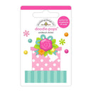 A package of modeling design LLC 'doodle-pops' cardstock stickers, featuring a pink gift box with white polka dots, a large pink rose, green leaves, and colorful decorative accents on a white backing card.