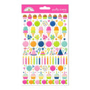 A sheet of colorful 'puffy icons designs' stickers by Sweetener Studio, featuring illustrations of cupcakes, ice cream cones, lollipops, candles, party hats, flowers, and confetti on a white backing card with a pink header.