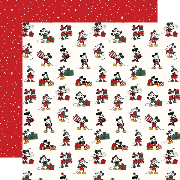 A sheet of double-sided holiday paper featuring a repeating pattern of Mickey Mouse carrying Christmas gifts on a cream background, with a solid red reverse side decorated with white snowflakes.