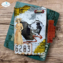Decorative tag with vintage-style design featuring a woman, a man, and a license plate number on a wooden surface.