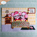 A handmade Christmas card or craft plaque featuring two cartoon mice in bed under a red and green floral blanket, with a nightstand, lamp, alarm clock, and a sign that reads 'Christmas dreams start HERE.' The card is photographed against a patterned green background, and the Elizabeth craft designs logo appears in the top left corner.