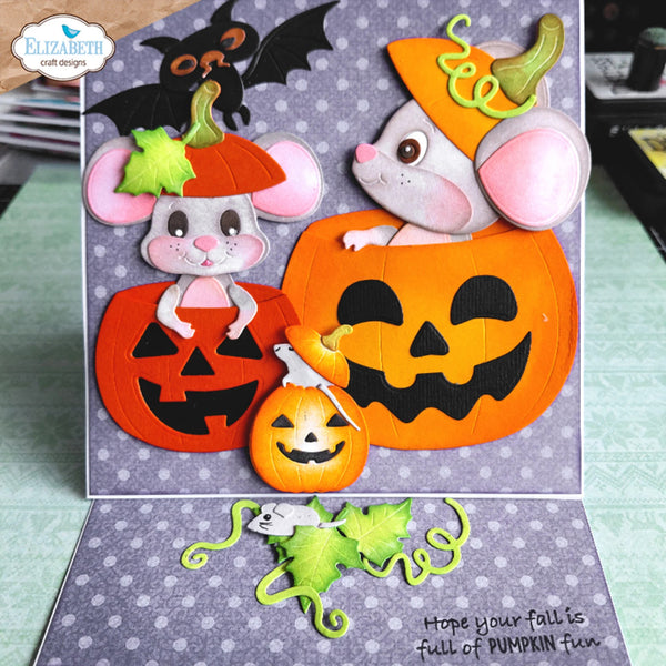 A handmade 3D pop-up Halloween greeting card by Elizabeth Craft Designs, featuring three cute paper mice in jack-o'-lantern costumes on a purple patterned card base.