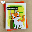 A handmade greeting card featuring a layered paper cat with orange and white fur, set against a yellow-green watercolor background with the text 'Have a purrfect day!'. The card is displayed on top of orange envelopes on a brown kraft paper background, with an 'Elizabeth craft designs' logo in the top-left corner.