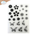 A sheet of clear and black stamp designs featuring various floral, circular, and butterfly motifs, displayed on a white background with a brand logo in the top-left corner.