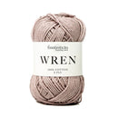 A single ball of Fiddlesticks Knitting Yarn in the shade WREN, featuring a dusty mauve-pink color with a white paper label in the center.