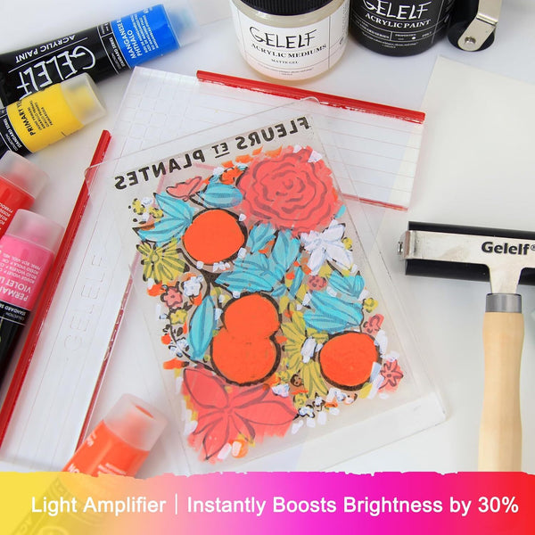 A Gelelf Light Amplifier sheet with a colorful floral design, displayed on a white surface surrounded by Gelelf acrylic paints, a rubber stamp, and a hammers tool.