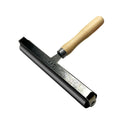 Metal tool with wooden handle on a white background