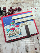 A handmade Christmas greeting card with scalloped edges, featuring three cartoon snowmen, a brown tree trunk, and text reading 'SNOW & COCO', 'SANTA CLAUS', and 'FALALA'. The card is styled on a rustic white wood surface with red berries and small red sequins.