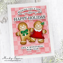 A handmade holiday greeting card featuring two 3D gingerbread figures, one in a green outfit and one in a red outfit, on a pink patterned background. The card reads 'WISHING YOU A VERY HAPPY HOLIDAY AND A WONDERFUL NEW YEAR'.
