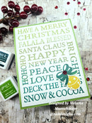 A handmade greeting card with a white background, green border, and festive typography reading 'HAVE A MERRY CHRISTMAS FALALA BLESSED SANTA CLAUSS HAPPY NEW YEAR PEACE LOVE DECK THE HOUSE SNOW & COCA' in green and teal. The card is decorated with a green bow, yellow ornament, and red berry embellishments.