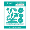 Gina K. Designs Cherry Blossoms 100% steel cutting dies card, featuring teal-colored floral and leaf shapes, a 'Birthday Wishes' script, and decorative text on a white background with a teal border.