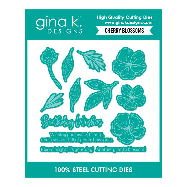 Gina K. Designs Cherry Blossoms 100% steel cutting dies card, featuring teal-colored floral and leaf shapes, a 'Birthday Wishes' script, and decorative text on a white background with a teal border.