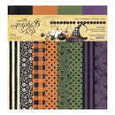 A package of scrapbook paper featuring a Halloween theme, with 18 patterns and solids sheets. The packaging shows a collage of patterned sheets including black and white florals, black and orange plaid, orange and black polka dots, sage green floral patterns, and purple cracked and web textures.