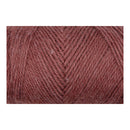 A close-up of twisted yarn fibers in a dusty rose or mauve-brown shade, centered on a white background.